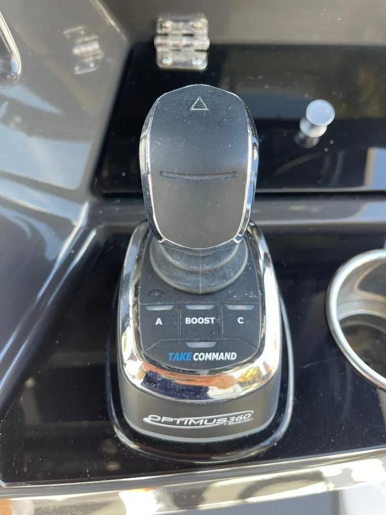 Slide: The Image of Optimus 360 joystick control on 2019 Blackfin 272 CC boat dashboard. - 22