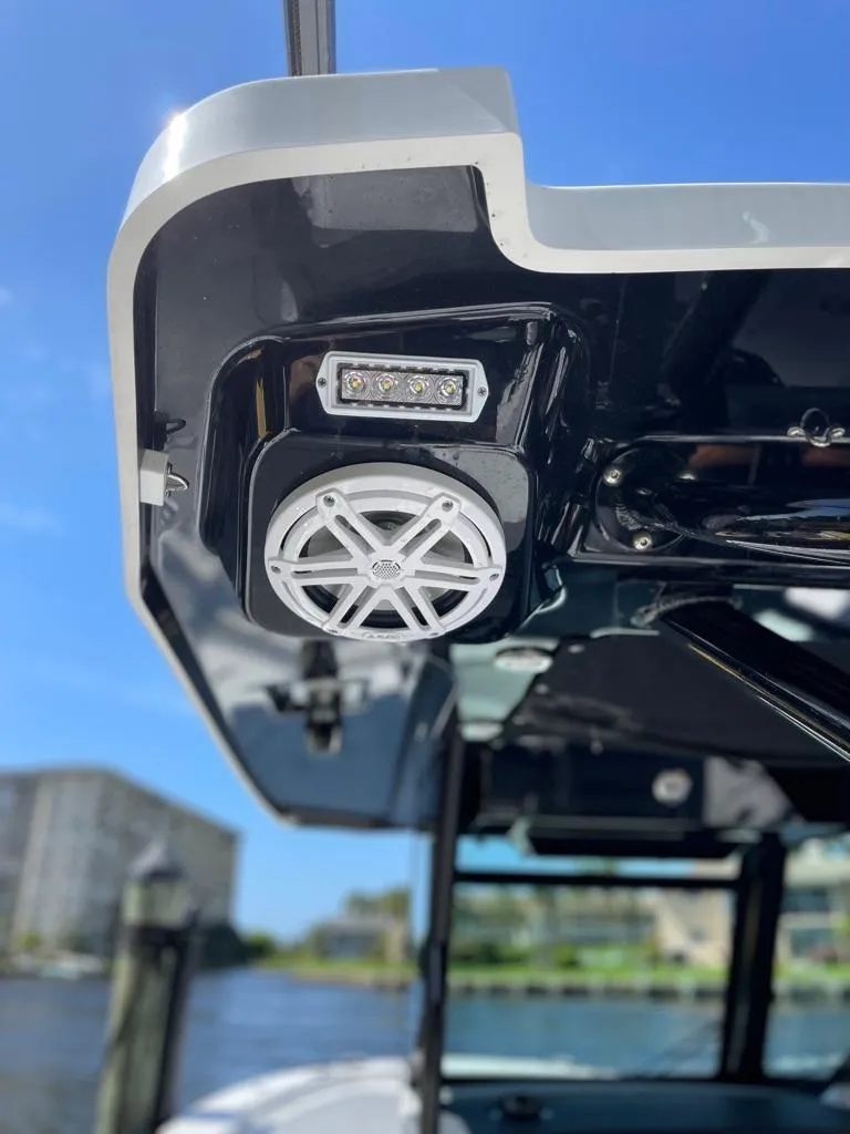 Slide: The Image of 2019 Blackfin 272 CC boat speaker and light detail against a clear blue sky. - 26