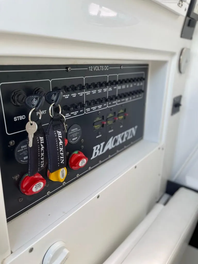Slide: The Image of Control panel of a 2019 Blackfin 272 CC boat with keys inserted. - 30