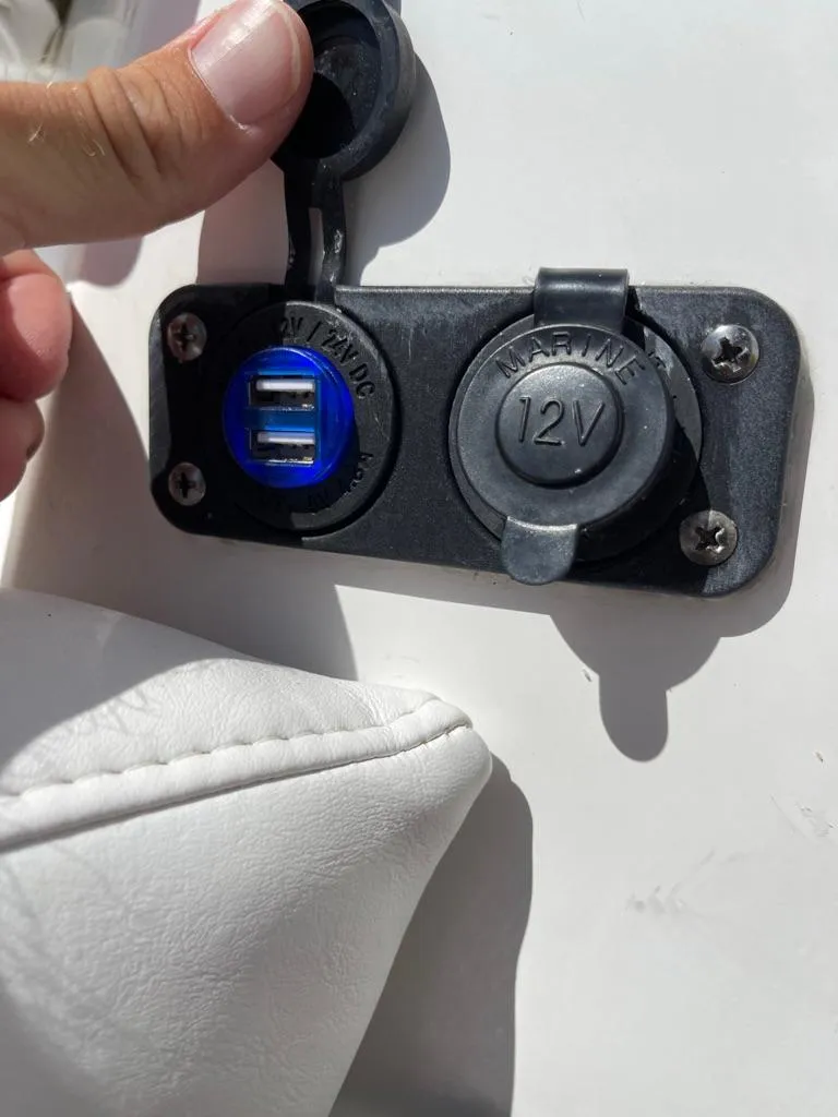 Slide: The Image of 2019 Blackfin 272 CC boat USB and 12V marine power outlets. - 45