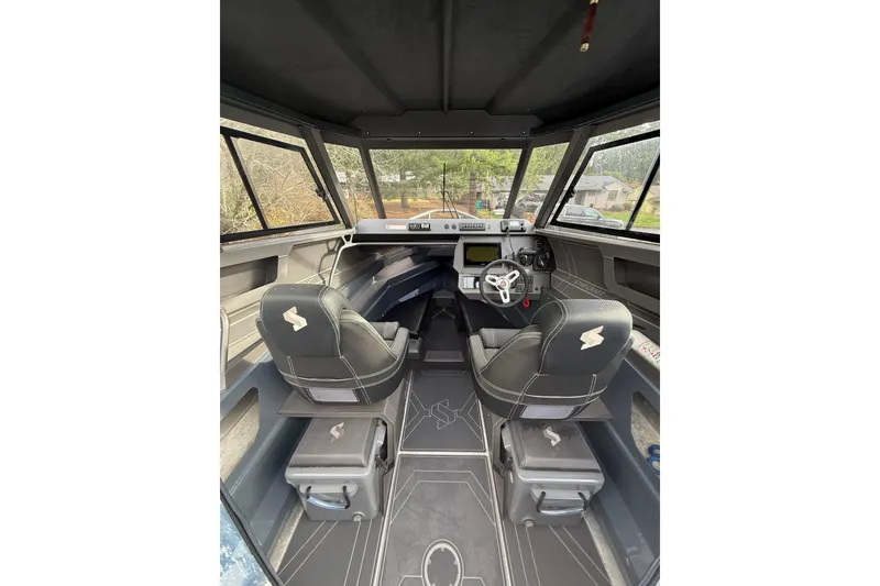 Slide: The Image of 2024 Stabicraft 2050 Supercab interior with modern dashboard and seating. - 11