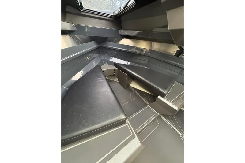 Slide: The Image of 2024 Stabicraft 2050 Supercab interior with cushioned seating and sleek design. - 16