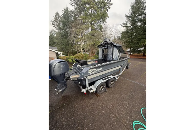 Slide: The Image of 2024 Stabicraft 2050 Supercab boat on trailer, parked outdoors. - 3