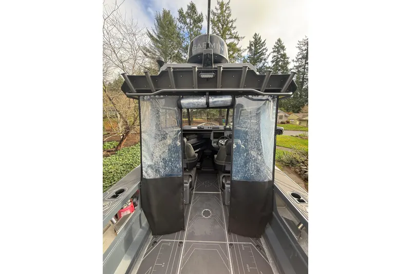Slide: The Image of 2024 Stabicraft 2050 Supercab boat interior with clear canopy and modern design. - 7