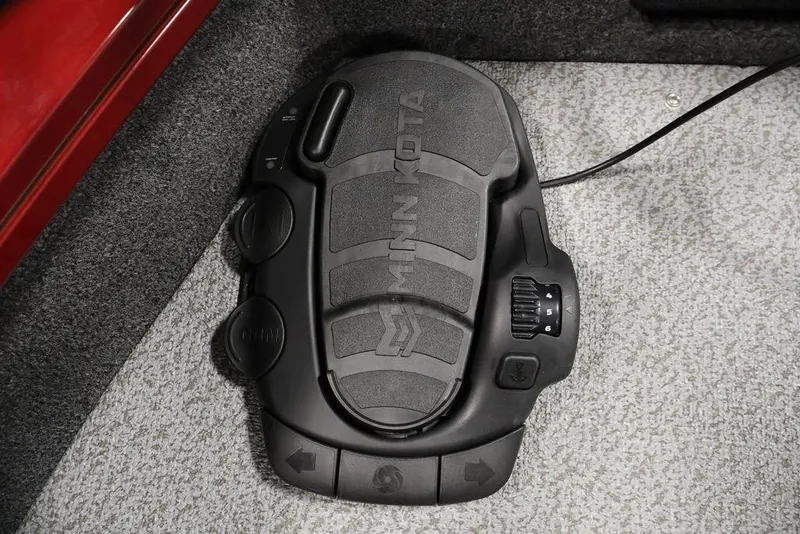 Slide: The Image of Foot pedal control in 2026 Lowe Fishing Machine 1875 boat, featuring Minn Kota branding. - 12