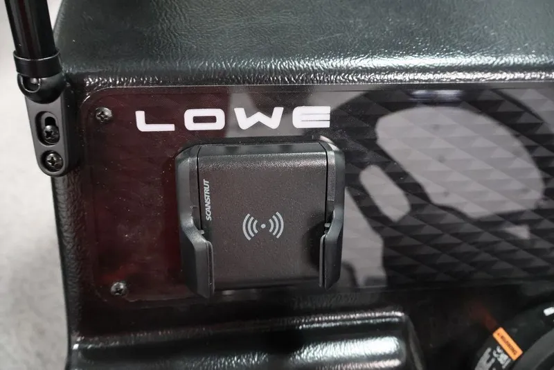 Slide: The Image of 2026 Lowe Fishing Machine 1875 dashboard with wireless charging pad. - 25