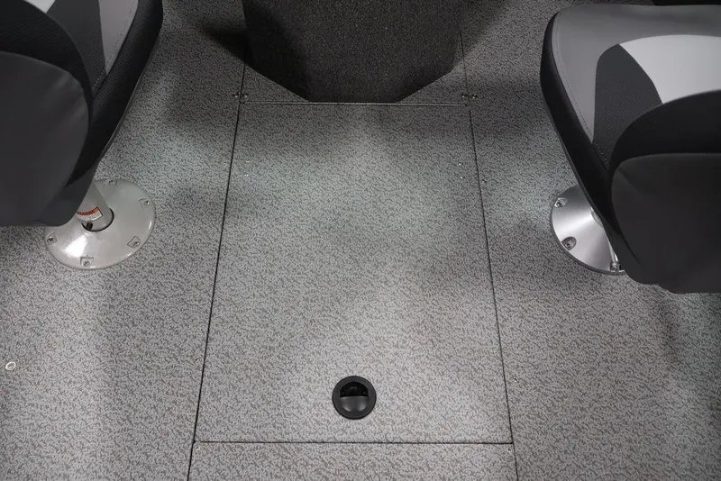 Slide: The Image of 2026 Lowe Fishing Machine 1875 interior with gray textured flooring and two seats. - 27