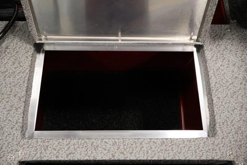 Slide: The Image of Open storage compartment in 2026 Lowe Fishing Machine 1875 boat. - 34