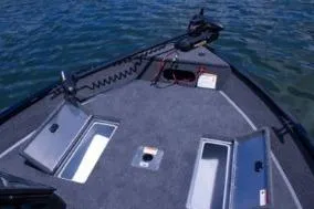 Slide: The Image of 2026 Lowe Fishing Machine 1875 boat with Mercury engine, red and gray interior. - 8