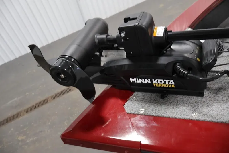 Slide: The Image of 2026 Lowe Fishing Machine 1875 with Minn Kota Terrova trolling motor on red deck. - 9