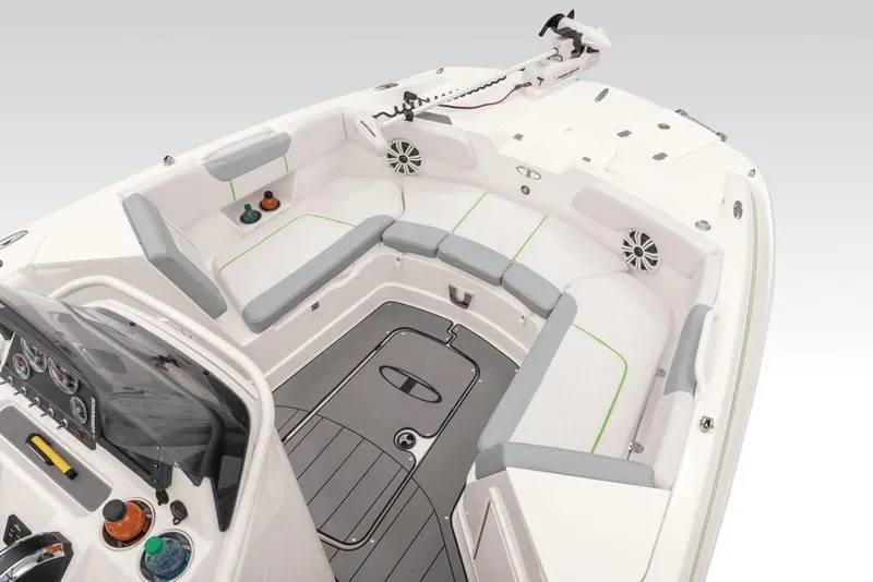 Slide: The Image of 2020 Tahoe 2150 CC boat interior with seating and control panel. - 30