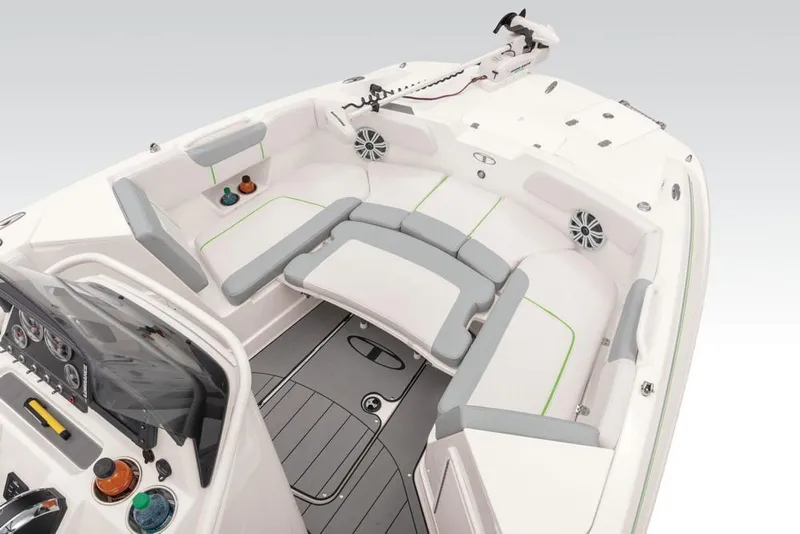 Slide: The Image of 2020 Tahoe 2150 CC boat interior with seating and control panel. - 33