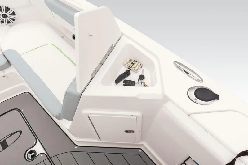 Slide: The Image of 2020 Tahoe 2150 CC boat interior with storage compartment and seating area. - 42