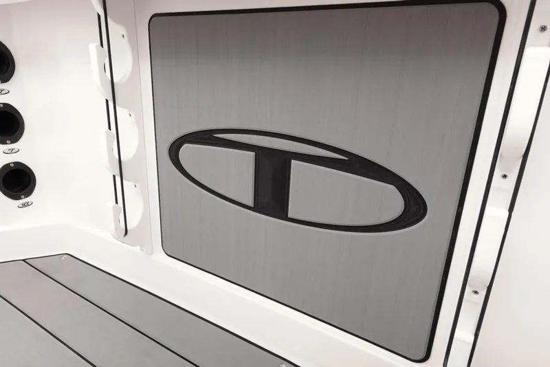 Slide: The Image of 2020 Tahoe 2150 CC boat interior with logo and sleek design elements. - 48