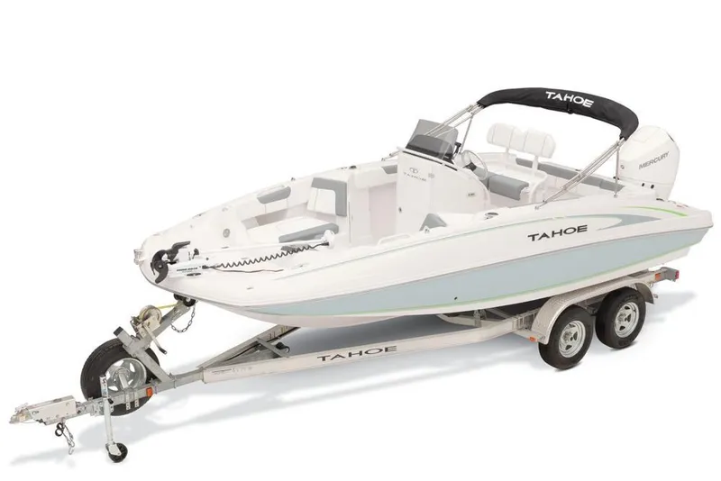 Slide: The Image of 2020 Tahoe 2150 CC boat on trailer, white with black canopy. - 6