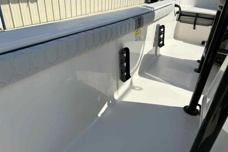 Slide: The Image of 2026 Carolina Skiff 21 LS boat interior with sleek white design and modern features. - 12
