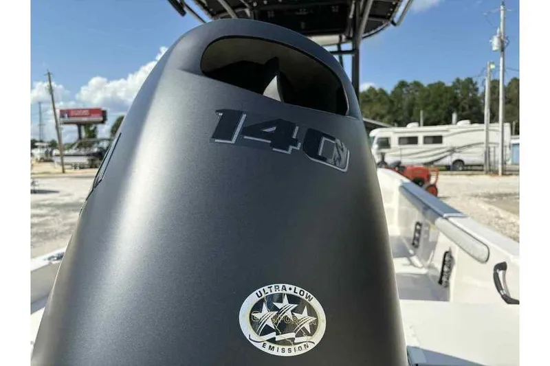 Slide: The Image of 2026 Carolina Skiff 21 LS boat engine, featuring 140 horsepower and ultra-low emission technology. - 13