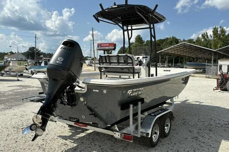Slide: The Image of 2026 Carolina Skiff 21 LS boat on trailer, outdoor display, sunny day. - 5