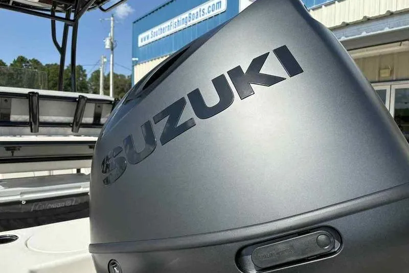Slide: The Image of Suzuki engine on 2026 Carolina Skiff 21 LS boat at Southern Fishing Boats dealership. - 8