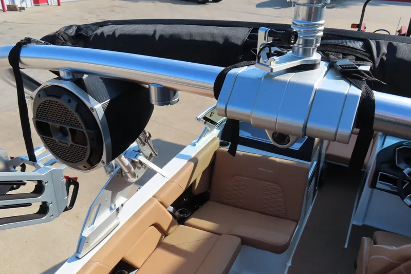 Slide: The Image of 2019 MasterCraft X22 boat interior with speakers and seating, showcasing luxury features. - 12