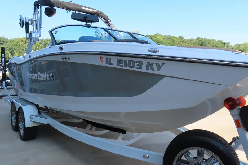 Slide: The Image of 2019 MasterCraft X22 boat on trailer, side view with registration number. - 3