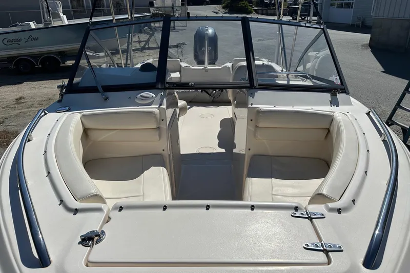 Slide: The Image of 2015 Grady-White Freedom 192 boat interior with seating and windshield. - 6