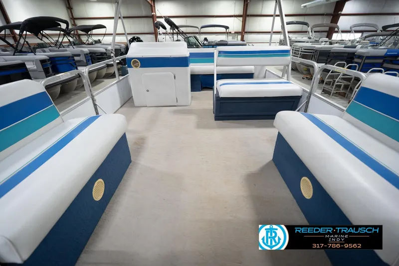 Slide: The Image of 1996 Godfrey Sweetwater 180 EX boat interior with steering console and seating. - 15