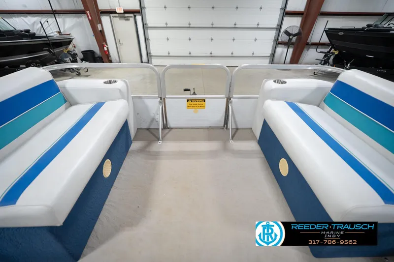 Slide: The Image of 1996 Godfrey Sweetwater 180 EX pontoon boat interior with steering console and seating. - 20