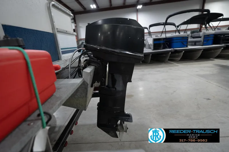 Slide: The Image of Cup holder on a 1996 Godfrey Sweetwater 180 EX boat, Reeder Trausch Marine logo visible. - 39