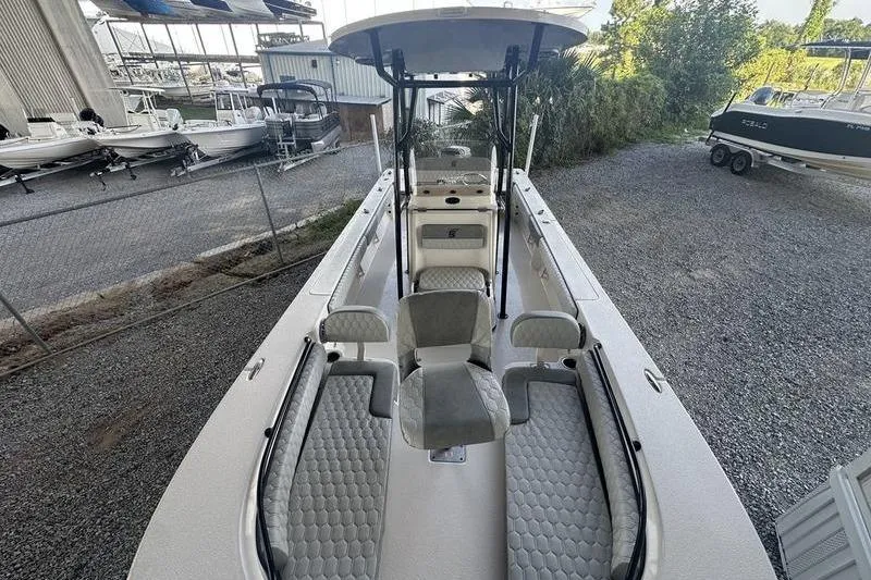 Slide: The Image of 2026 Carolina Skiff 24 Ultra Elite boat with spacious seating and modern design. - 4