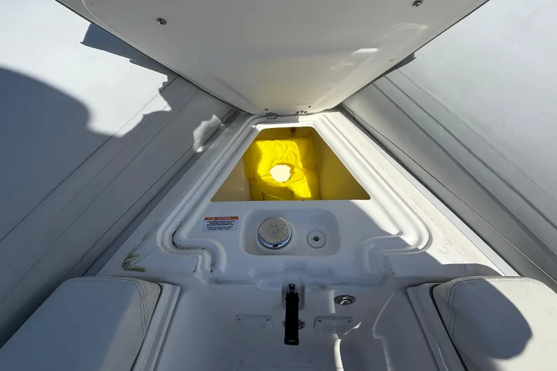 Slide: The Image of 2020 AB Inflatables Oceanus 21 VST storage compartment with yellow life jacket inside. - 17