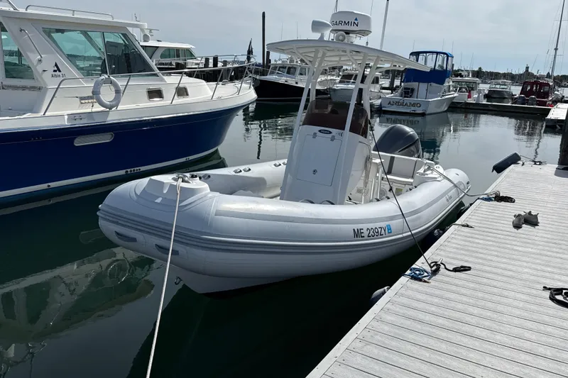 Slide: The Image of 2020 AB Inflatables Oceanus 21 VST boat docked at marina. - 23
