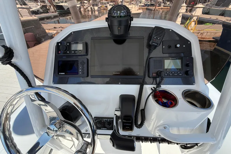 Slide: The Image of Control panel of 2020 AB Inflatables Oceanus 21 VST with navigation and communication equipment. - 9