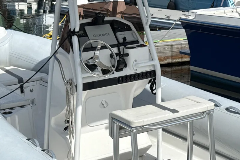 Slide: The Image of 2020 AB Inflatables Oceanus 21 VST boat interior with Garmin navigation system. - 7