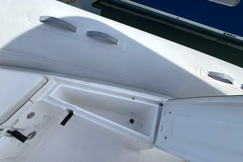 Slide: The Image of 2020 AB Inflatables Oceanus 21 VST boat interior storage compartment open. - 18
