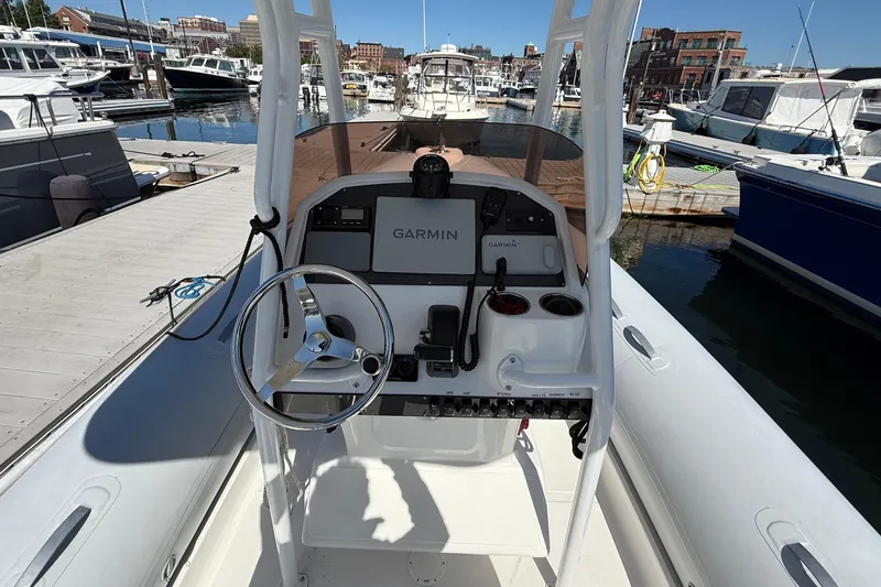 Slide: The Image of 2020 AB Inflatables Oceanus 21 VST boat dashboard with Garmin navigation at marina. - 8