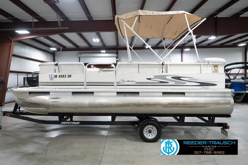 Slide: The Image of 2008 Misty Harbor 2085CR pontoon boat on trailer in indoor showroom. - 11