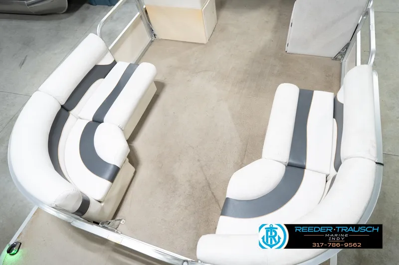 Slide: The Image of 2008 Misty Harbor 2085CR boat interior with white and gray seating arrangement. - 12