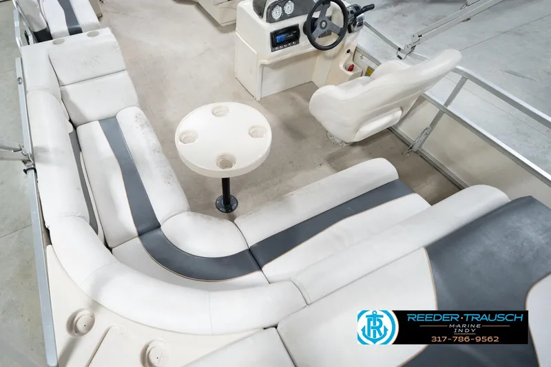 Slide: The Image of Interior of a 2008 Misty Harbor 2085CR pontoon boat with seating and steering console. - 15