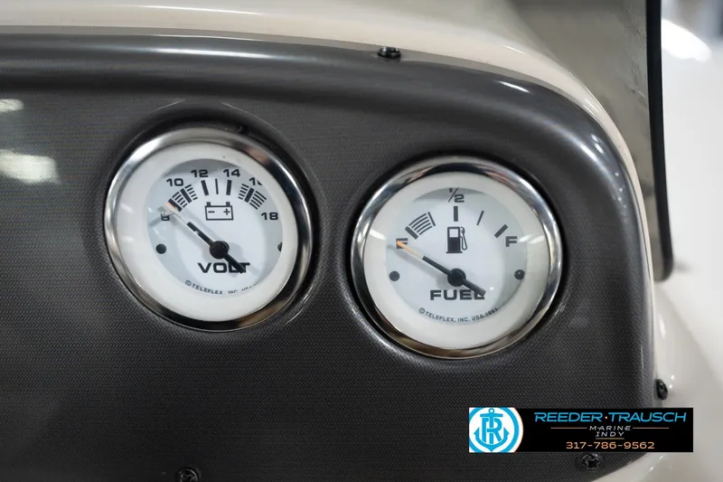 Slide: The Image of Close-up of 2008 Misty Harbor 2085CR boat dashboard with volt and fuel gauges. - 31