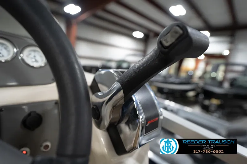Slide: The Image of Close-up of 2008 Misty Harbor 2085CR boat throttle in a showroom. - 33