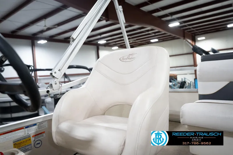 Slide: The Image of 2008 Misty Harbor 2085CR boat seat in a showroom, featuring Reeder Trausch Marine logo. - 34