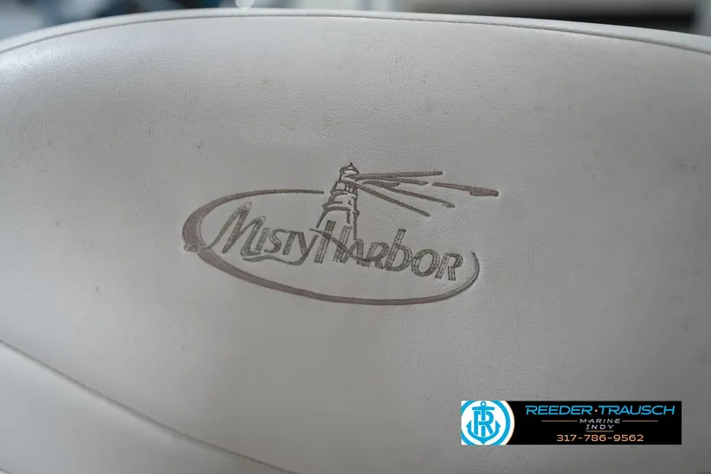 Slide: The Image of Misty Harbor 2085CR 2008 boat seat with logo and Reeder-Trausch Marine contact details. - 35