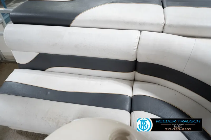 Slide: The Image of 2008 Misty Harbor 2085CR boat seating with white and gray upholstery. - 36