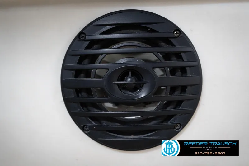 Slide: The Image of Close-up of a black speaker grill on a 2008 Misty Harbor 2085CR boat. - 39