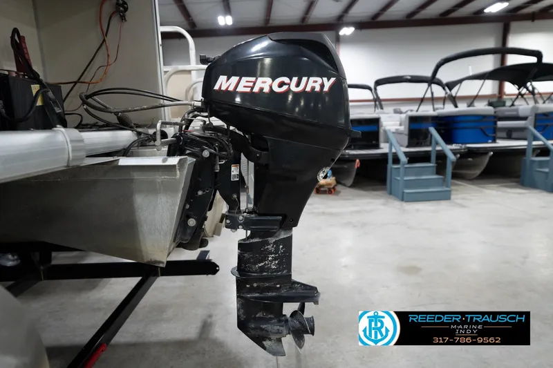 Slide: The Image of 2008 Misty Harbor 2085CR with Mercury outboard motor in a showroom. - 42