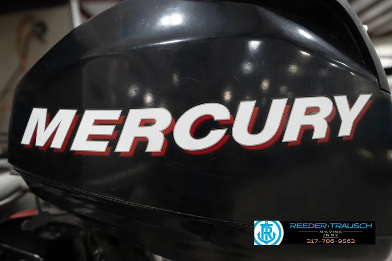 Slide: The Image of Mercury outboard motor on 2008 Misty Harbor 2085CR boat, Reeder-Trausch Marine logo visible. - 43