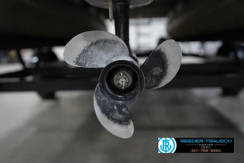 Slide: The Image of Close-up of a 2008 Misty Harbor 2085CR boat propeller in a workshop setting. - 46