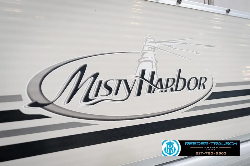 Slide: The Image of 2008 Misty Harbor 2085CR logo with lighthouse design on boat exterior. - 47