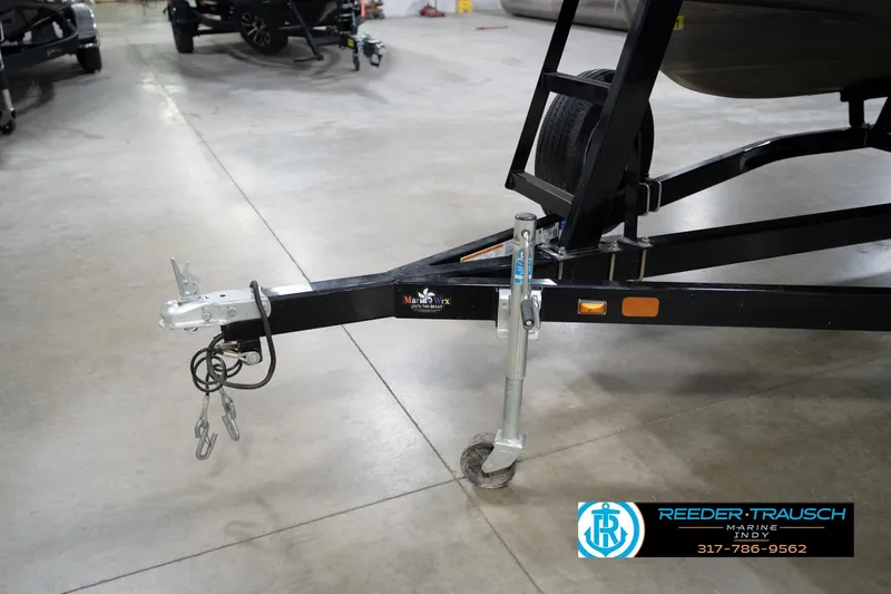 Slide: The Image of Trailer hitch of a 2008 Misty Harbor 2085CR boat in a showroom. - 48